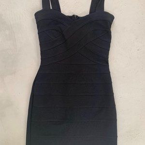 Black form fitting mini dress with ribbed detail